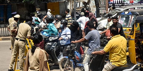 Police block a street, allowing only those who are travelling to get essential commodities to pass through, during the lockdown in Hyderabad. (Photo| Vinay Madapu, EPS)