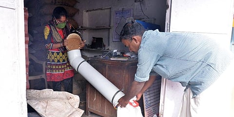 The pipe’s curved end makes it convenient for the suppliers to ensure there is no waste of supply. (Photo | Vincent Pulickal, EPS)