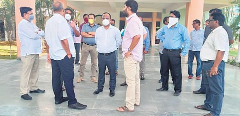 RDC Anil Kumar Samal interacting with officials at DRIEMS in Cuttack on Friday. (Photo | EPS)