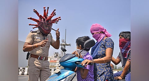 A police inspector wearing corona helmet. (Photo| Debadatta Mallick, EPS)