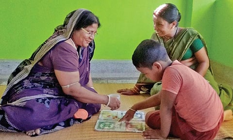 Members of a family playing ludo at their home in a village | EXPRESS