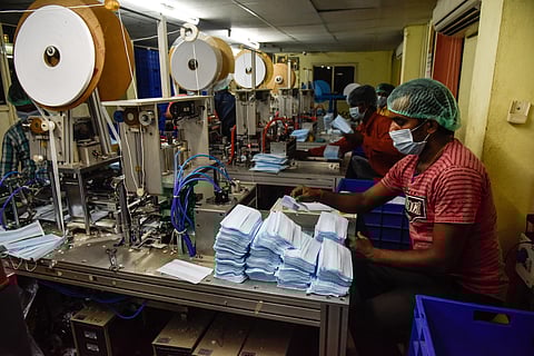 Manufacturers in Hyderabad busy stitching masks in the wake of coronavirus spread. (Photo | Vinay madapu, EPS)
