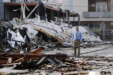 A man looks over buildings destroyed by storms Tuesday, March 3, 2020, in Nashville, Tenn. (Photo | AP)