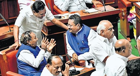 BJP MLA Basangouda Patil Yatnal and Rural Development Minister KS Eshwarappa during the Assembly session at Vidhana Soudha on Monday |Express