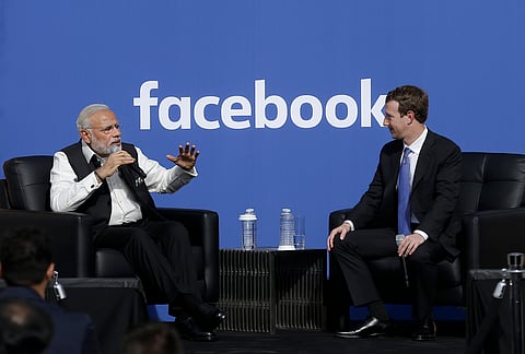 Prime Minister of India Narendra Modi, left, speaks next to Facebook CEO Mark Zuckerberg at Facebook. ( AP Photo)
