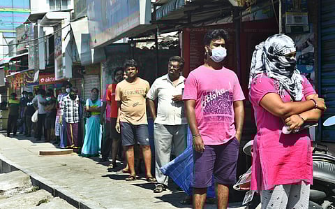 Residents queued up at a fish market. (Photo | Ashwin Prasath, EPS)