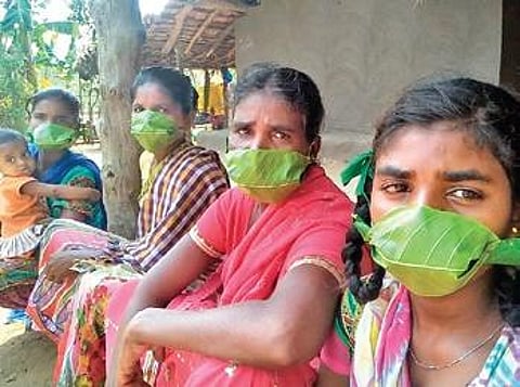 Tribals residing in the agency areas of the district have made face masks out of teak leaves.