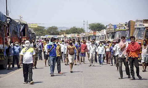 Truck drivers and cleaners stranded at Ambuja Cement Plant during the nationwide lockdown amid coronavirus pandemic at Ulwe in Navi Mumbai Monday March 30 2020. (Photo | PTI)