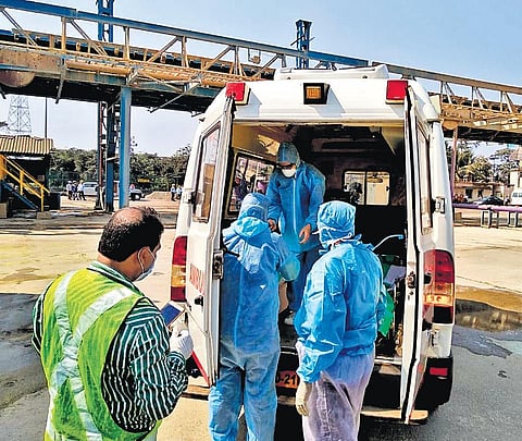 The crew member suspected to be affected by coronavirus being taken to SCB hospital from Paradip port. (Photo | EPS)