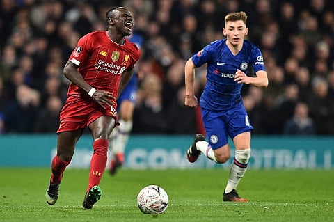 Chelsea's Billy Gilmour and Liverpool's Sadio Mane fight for the ball during their FA Cup tie. (Photo | AFP)