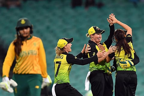 Australia's players celebrate the dismissal of South Africa's Dane van Niekerk during the Twenty20 women's World Cup semi-final cricket match between Australia and South Africa in Sydney. (Photo | AFP)