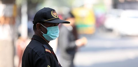 People wearing a protective mask in the wake of novel coronavirus or COVID-19 outbreak at Safderjung Hospital in New Delhi on Wednesday. (Photo | Shekhar Yadav, EPS)