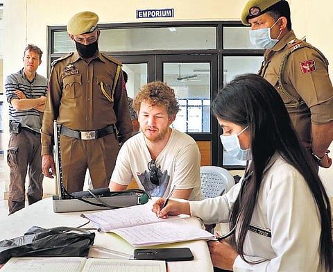 A German tourist undergoes screening on Jammu-Pathankot National Highway at Lakhanpur on Wednesday in wake of the deadly novel coronavirus spread | PTI