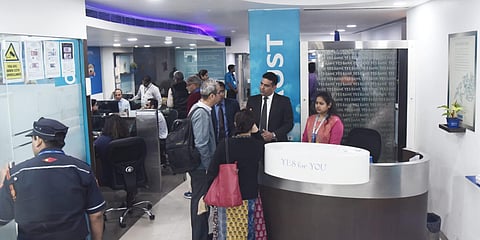 Customers gather inside the YES bank branch at Janpath in New Delhi. (Photo| Parveen Negi, EPS)