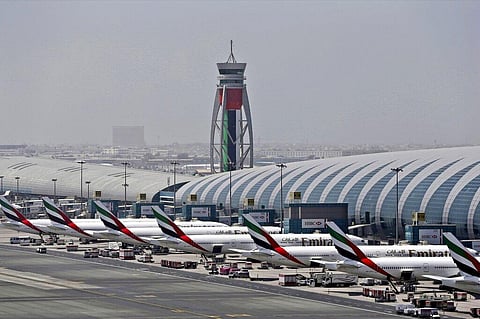 Emirates planes are parked at the Dubai International Airport in Dubai, United Arab Emirates. Major disruptions due to the new coronavirus have already caused the equivalent of a roughly $100 million loss to airline carriers in the Middle East region. (Ph