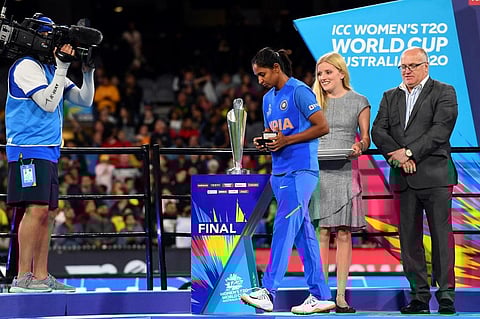 India's captain Harmanpreet Kaur walks past the trophy during the ceremony of the Twenty20 women's cricket World Cup final between Australia and India in Melbourne. (Photo | AFP)