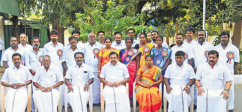 Chief Minister Edappadi K Palaniswami with the new members of AIADMK at Tiruvarur on Sunday