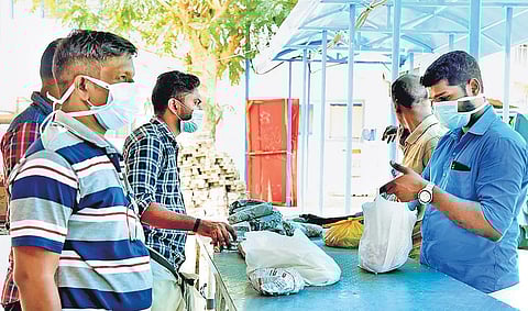 People wearing masks at Pathanamthitta General Hospital, where the virus-infected family has been admitted. (Photo| EPS/SHAJI VETTIPURAM)