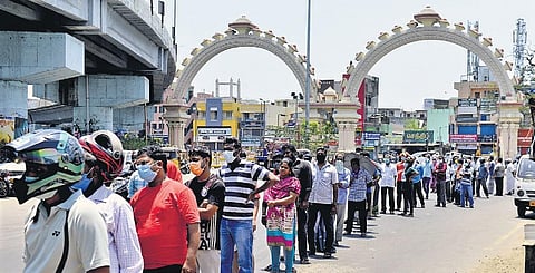People waiting outside Anna Government Siddha Hospital for a herbal syrup, which they believe can fight the virus | D SAMPATH KUMAR
