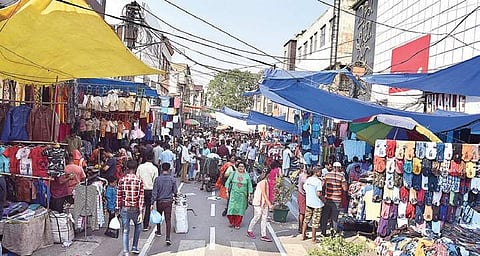 Traders say footfall has gone down due to inadequate parking space | EXPRESS