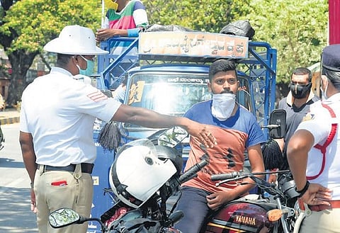 Police stop commuters flouting lockdown orders in Mysuru I UDAYSHANKAR S