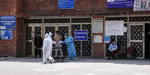 Medical staff wear protective suits while fighting against the COVID-19 pandemic at LNJP Hospital in New Delhi. (File photo| ANI)