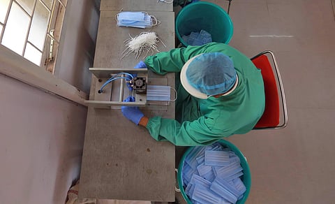 CRPF personnal stich facemask at a camp in RK Puram. (Photo | Shekhar Yadav, EPS)