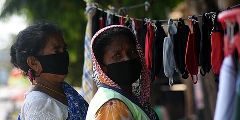 eople wearing masks during lockdown in Bhubaneswar. (Photo | Biswanath Swain, EPS)
