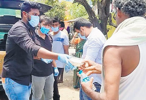 Kafe Latte owners distributed 560 packets of food every day