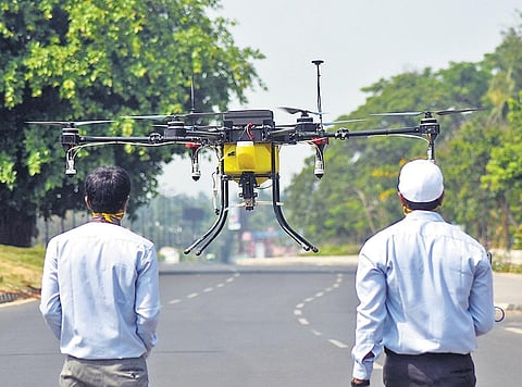 Disinfectant being sprayed from a drone along Janpath in Bhubaneswar on Tuesday | express