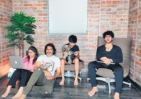 Dinesh Arora(second from right) is spending time with family by watching movies during this lockdown