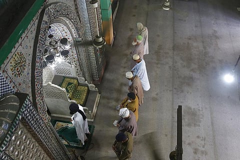 People attend Friday prayers at a mosque during a nation-wide lock down as a preventive measure against the outbreak of coronavirus, in Lahore, Pakistan, April 17, 2020. (Photo | AP)