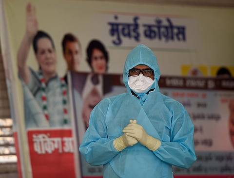 A doctor prepares to conducts swab tests of journalists as a preventive measure against COVID 19 during the nationwide lockdown to curb the spread of coronavirus at CSMT in Mumbai Thursday April 16 2020. (Photo | PTI)