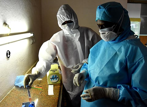 Doctors testing the samples at maternity hospital. (Photo | Madhav K)