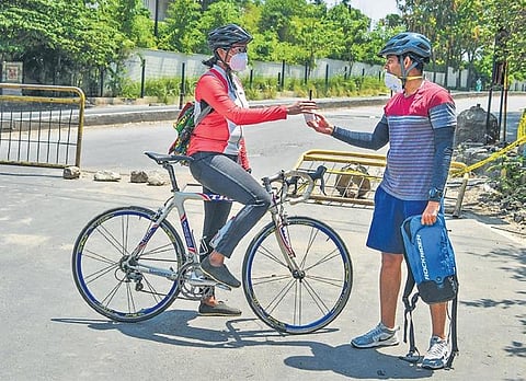 Members of the cycle relay team that delivered cancer medicines from Kidwai Institute to the destination near Electronics City (Photo | Meghana Sastry)