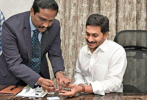 Chief Minister YS Jagan Mohan Reddy being tested for Covid-19 using an RDT kit at his camp office in Tadepalli on Friday. His result returned negative. (Photo | EPS)