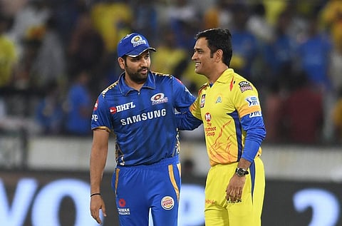 Mumbai Indians cricket team captain Rohit Sharma (L) and Chennai Super Kings captain Mahendra Singh Dhoni. (Photo | AFP)