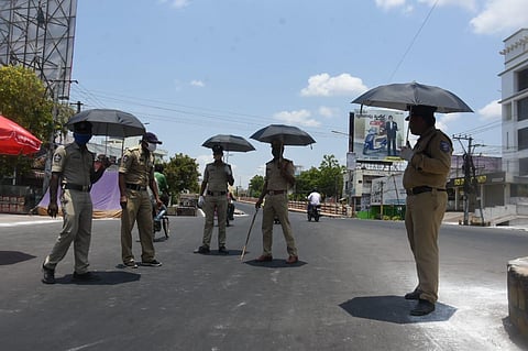 Police personnel at a check point. (Photo| EPS/ P Ravindra Babu)