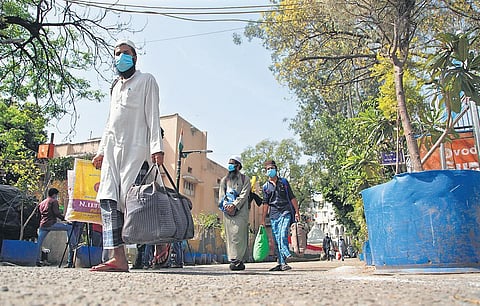 Suspected novel coronavirus patients Nizamuddin area being taken to hospital for tests. (Photo | Anil Shakya, EPS)