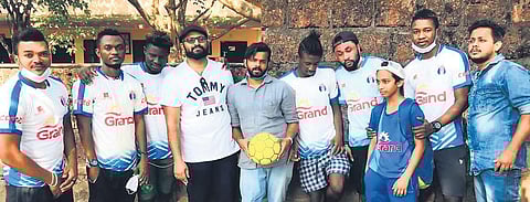 Al Madeena club’s foreign players with team manager Ashraf Ali, fourth left