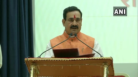 BJP leader Narottam Mishra taking oath. (Photo | ANI Twitter)