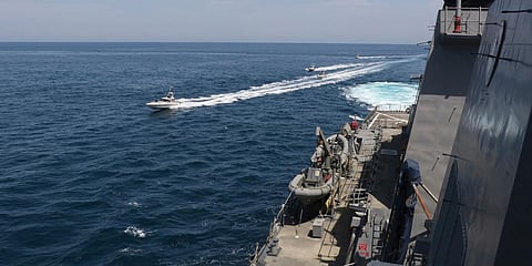 Iranian Revolutionary Guard vessels sail close to US military ships in the Persian Gulf near Kuwait. (File photo| AP)