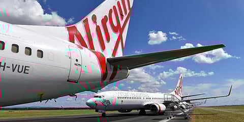 Virgin Australia aircraft are parked at Brisbane Airport in Brisbane, Australia. (Photo | AP)