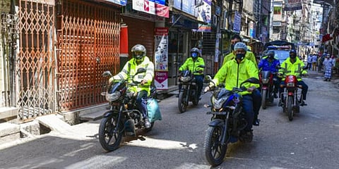 Police members wear protective equipment as they patrol the streets during the nationwide lockdown as a preventive measure against the Coronavirus outbreak, in Dhaka. (Photo | AP)