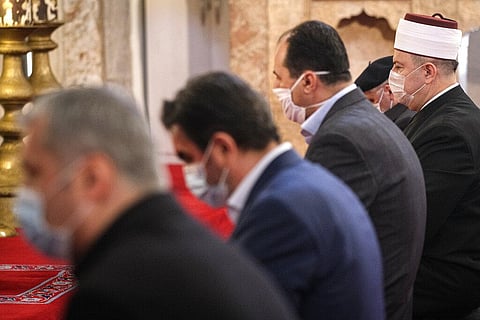 Islamic clerics attend prayers held without public due to COVID-19 restrictions in a mosque in Sarajevo, Bosnia, Friday, April 24, 2020 during the first day of the holy fasting month of Ramadan. (Photo | AP)