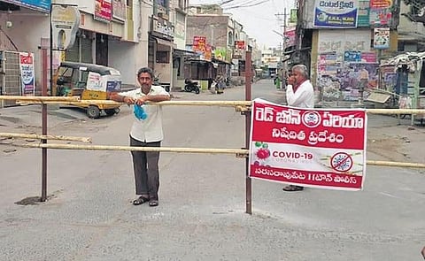The barricaded Palnadu road in Narasaraopet, which was declared a red zone. (Photo | EPS)