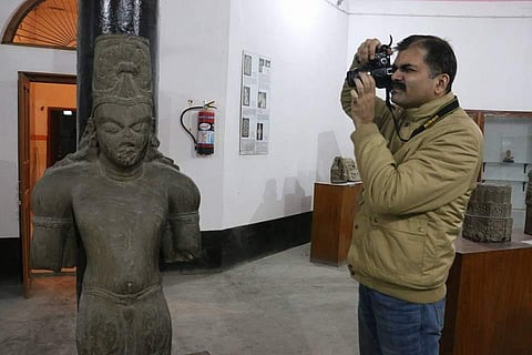 DIG Vikas Vaibhav photographing a historical idol (Photo | Facebook)