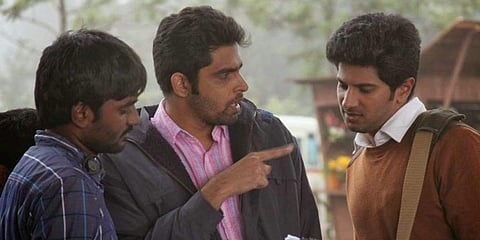 Director Balaji Mohan with actor Dulquer Salmaan during the filming of 'Vaayai Moodi Pesavum'.