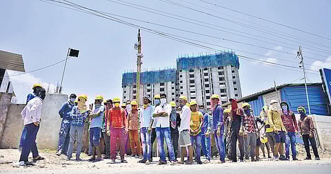Migrant workers, mostly from Uttar Pradesh, Bihar, Odisha and West Bengal, protest outside a construction site along Chennai Bypass Road (PHOTO | DEBADATTA MALLICK, EPS)