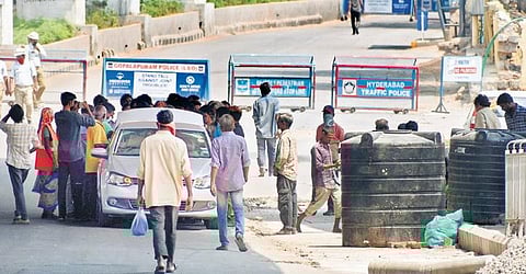 Tight security outside the Gandhi Hospital where attendants wait (Photo | S Senbagapandiyan, EPS)